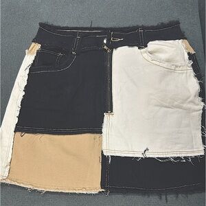 Multi colored distressed jean skirt
